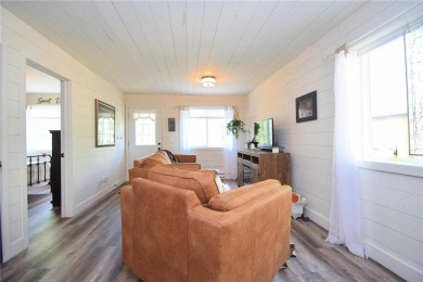 Not your average cottage! This 2023 built Timberland Cottage has on Voyager Village Country Club - Voyager in Wisconsin - for sale on GolfHomes.com, golf home, golf lot