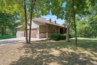 Situated on an oversized corner lot in the gated community of on The Coves Golf Course in Oklahoma - for sale on GolfHomes.com, golf home, golf lot