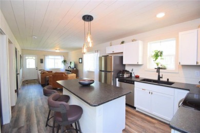 Not your average cottage! This 2023 built Timberland Cottage has on Voyager Village Country Club - Voyager in Wisconsin - for sale on GolfHomes.com, golf home, golf lot