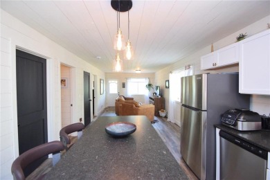 Not your average cottage! This 2023 built Timberland Cottage has on Voyager Village Country Club - Voyager in Wisconsin - for sale on GolfHomes.com, golf home, golf lot