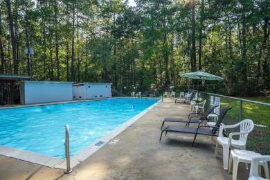 Charming southern cottage tucked away in the trees! You will on The Aiken Golf Club in South Carolina - for sale on GolfHomes.com, golf home, golf lot
