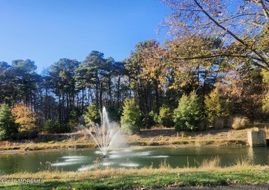 NEWER WARWICK II MODEL WITH PRIVATE WOODED SETTING NEAR GOLF on Greenbriar At Ocean Aire Golf and Country Club in New Jersey - for sale on GolfHomes.com, golf home, golf lot