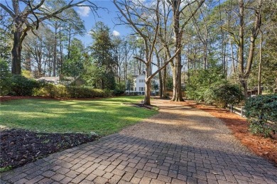 Lovely home on sought-after quiet street in the heart of on Bobby Jones Golf Club in Georgia - for sale on GolfHomes.com, golf home, golf lot