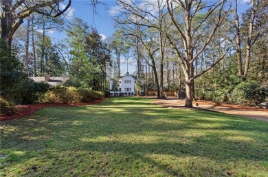 Lovely home on sought-after quiet street in the heart of on Bobby Jones Golf Club in Georgia - for sale on GolfHomes.com, golf home, golf lot