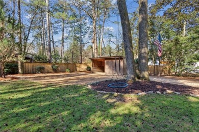 Lovely home on sought-after quiet street in the heart of on Bobby Jones Golf Club in Georgia - for sale on GolfHomes.com, golf home, golf lot