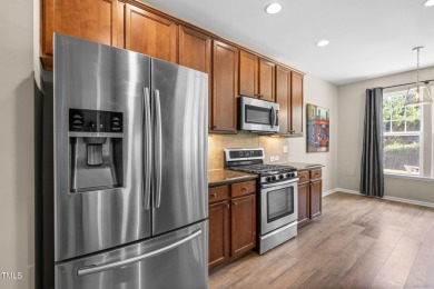 Welcome to 517 Hammond Oak Lane, a beautifully updated 3-bedroom on Heritage Golf Club in North Carolina - for sale on GolfHomes.com, golf home, golf lot
