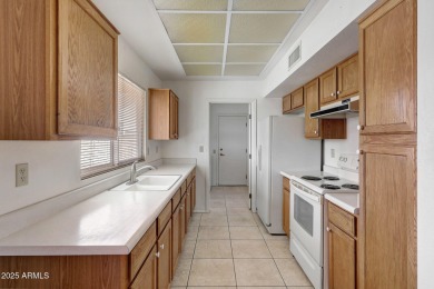 Welcome to this charming Sun City West home situated on an on Trail Ridge Golf Course in Arizona - for sale on GolfHomes.com, golf home, golf lot