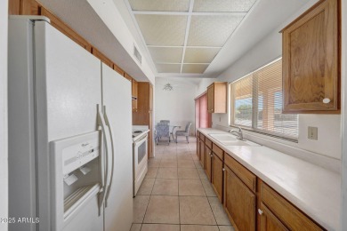 Welcome to this charming Sun City West home situated on an on Trail Ridge Golf Course in Arizona - for sale on GolfHomes.com, golf home, golf lot