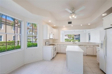 A Sought-after Berkeley model coach home with tranquil lake on Kensington Golf and Country Club in Florida - for sale on GolfHomes.com, golf home, golf lot