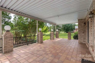 Beautiful all brick home on a spacious .56-acre lot, overlooking on Corbin Hills Golf Club in North Carolina - for sale on GolfHomes.com, golf home, golf lot