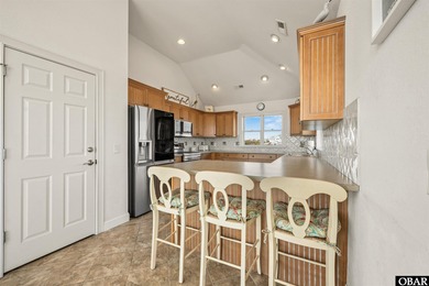 Welcome to 670 High Sand Dune Court, located in the gated on The Currituck Golf Club in North Carolina - for sale on GolfHomes.com, golf home, golf lot