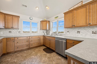 Welcome to 670 High Sand Dune Court, located in the gated on The Currituck Golf Club in North Carolina - for sale on GolfHomes.com, golf home, golf lot