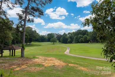 Beautiful all brick home on a spacious .56-acre lot, overlooking on Corbin Hills Golf Club in North Carolina - for sale on GolfHomes.com, golf home, golf lot