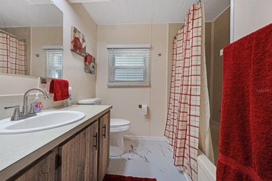 Step right up to your next chapter of fabulous living in this on Maple Leaf Golf and Country Club in Florida - for sale on GolfHomes.com, golf home, golf lot