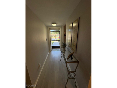 Main floor unit in desirable Clubhouse Village at Cross Creek on Cross Creek Country Club in Florida - for sale on GolfHomes.com, golf home, golf lot