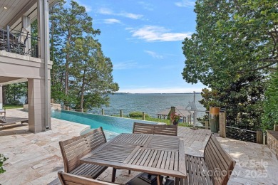 You will be In AWE at this WATERFRONT ESTATE w/mile-long views! on The Peninsula Club in North Carolina - for sale on GolfHomes.com, golf home, golf lot