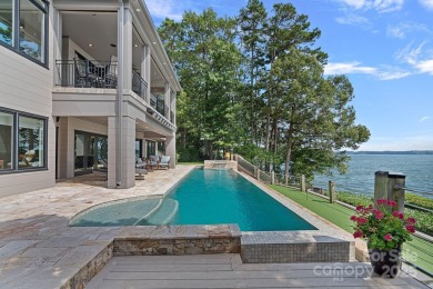 You will be In AWE at this WATERFRONT ESTATE w/mile-long views! on The Peninsula Club in North Carolina - for sale on GolfHomes.com, golf home, golf lot