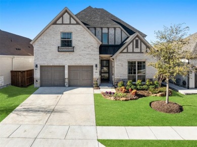 This STUNNING 5 bedroom home is located in The Tribute lakeside on The Tribute At the Colony in Texas - for sale on GolfHomes.com, golf home, golf lot