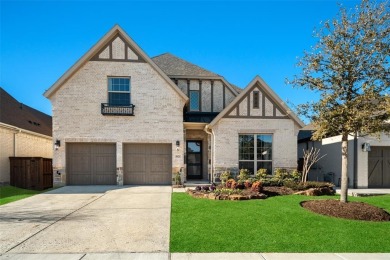 This STUNNING 5 bedroom home is located in The Tribute lakeside on The Tribute At the Colony in Texas - for sale on GolfHomes.com, golf home, golf lot