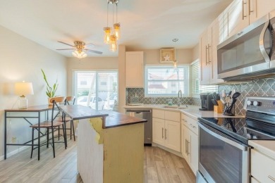 Location, lifestyle, and leisure await! Nestled in a beautifully on Isla Del Sol Yacht and Country Club in Florida - for sale on GolfHomes.com, golf home, golf lot