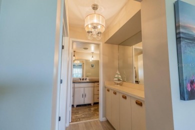 Location, lifestyle, and leisure await! Nestled in a beautifully on Isla Del Sol Yacht and Country Club in Florida - for sale on GolfHomes.com, golf home, golf lot