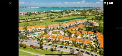 Location, lifestyle, and leisure await! Nestled in a beautifully on Isla Del Sol Yacht and Country Club in Florida - for sale on GolfHomes.com, golf home, golf lot