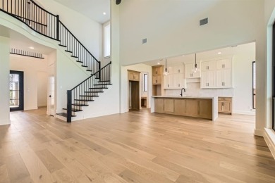Experience luxury living in a picturesque location! This custom on The Tribute At the Colony in Texas - for sale on GolfHomes.com, golf home, golf lot