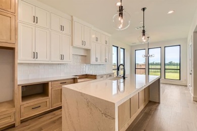 Experience luxury living in a picturesque location! This custom on The Tribute At the Colony in Texas - for sale on GolfHomes.com, golf home, golf lot