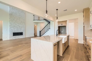 Experience luxury living in a picturesque location! This custom on The Tribute At the Colony in Texas - for sale on GolfHomes.com, golf home, golf lot