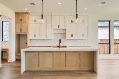 Experience luxury living in a picturesque location! This custom on The Tribute At the Colony in Texas - for sale on GolfHomes.com, golf home, golf lot