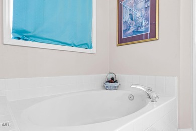 Well-maintained 3 bed 2.5 bath home with a 2-car garage on Hedingham Golf and Athletic Club in North Carolina - for sale on GolfHomes.com, golf home, golf lot