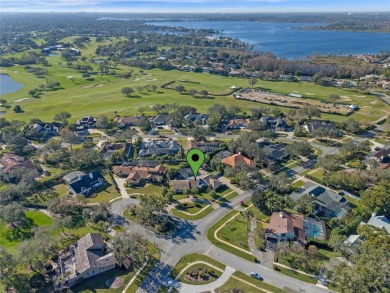 Nestled in the esteemed Bay Hill Golf Course neighborhood, this on Arnold Palmers Bay Hill Club and Lodge  in Florida - for sale on GolfHomes.com, golf home, golf lot