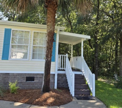 3 Bedroom, 2 bath immaculate home with one car garage, 20x12 on Wachesaw Plantation East Golf Course in South Carolina - for sale on GolfHomes.com, golf home, golf lot