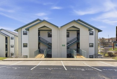 Welcome to easy living in this beautifully furnished penthouse on Thousand Hills Golf Resort in Missouri - for sale on GolfHomes.com, golf home, golf lot