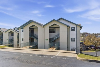 Welcome to easy living in this beautifully furnished penthouse on Thousand Hills Golf Resort in Missouri - for sale on GolfHomes.com, golf home, golf lot