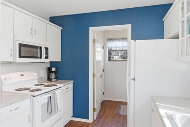 Welcome to easy living in this beautifully furnished penthouse on Thousand Hills Golf Resort in Missouri - for sale on GolfHomes.com, golf home, golf lot