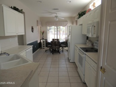 This home is located in ''The Grand'' community formerly known on Sun City Grand Golf Couse and Club in Arizona - for sale on GolfHomes.com, golf home, golf lot