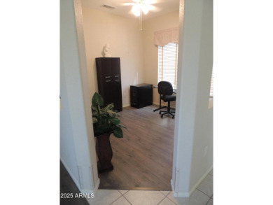 This home is located in ''The Grand'' community formerly known on Sun City Grand Golf Couse and Club in Arizona - for sale on GolfHomes.com, golf home, golf lot