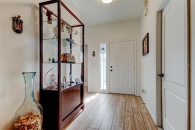 This fantastic Westchase home is located on a private wooded on Westchase Golf Club in Florida - for sale on GolfHomes.com, golf home, golf lot