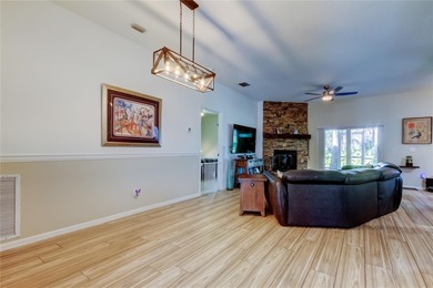 This fantastic Westchase home is located on a private wooded on Westchase Golf Club in Florida - for sale on GolfHomes.com, golf home, golf lot