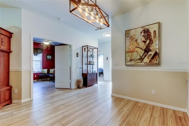 This fantastic Westchase home is located on a private wooded on Westchase Golf Club in Florida - for sale on GolfHomes.com, golf home, golf lot