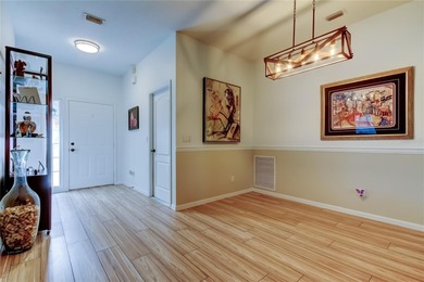 This fantastic Westchase home is located on a private wooded on Westchase Golf Club in Florida - for sale on GolfHomes.com, golf home, golf lot