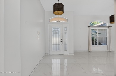 Live the Florida lifestyle in this pool home overlooking the St on St. Augustine Shores Golf Club in Florida - for sale on GolfHomes.com, golf home, golf lot