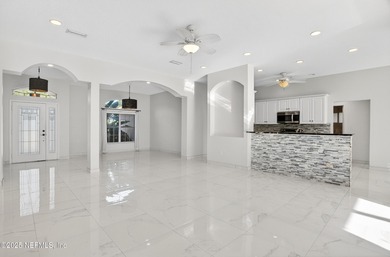 Live the Florida lifestyle in this pool home overlooking the St on St. Augustine Shores Golf Club in Florida - for sale on GolfHomes.com, golf home, golf lot