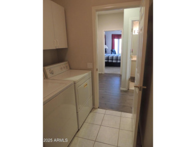 This home is located in ''The Grand'' community formerly known on Sun City Grand Golf Couse and Club in Arizona - for sale on GolfHomes.com, golf home, golf lot