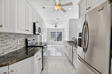 Live the Florida lifestyle in this pool home overlooking the St on St. Augustine Shores Golf Club in Florida - for sale on GolfHomes.com, golf home, golf lot