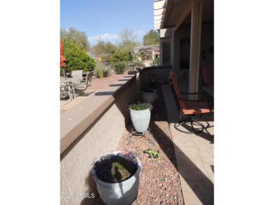 This home is located in ''The Grand'' community formerly known on Sun City Grand Golf Couse and Club in Arizona - for sale on GolfHomes.com, golf home, golf lot
