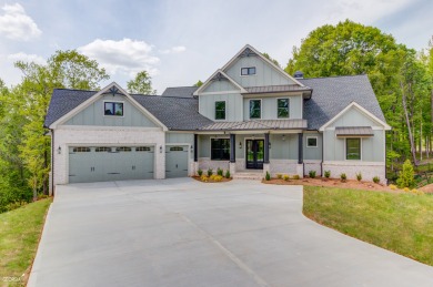 New Construction Stunner! The cute front porch welcomes you in on Traditions of Braselton Golf Club in Georgia - for sale on GolfHomes.com, golf home, golf lot