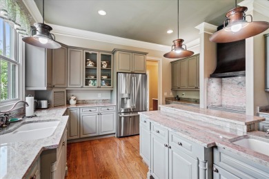 Nestled on a picturesque tree-lined street, this expansive home on Charleston National Golf Club in South Carolina - for sale on GolfHomes.com, golf home, golf lot