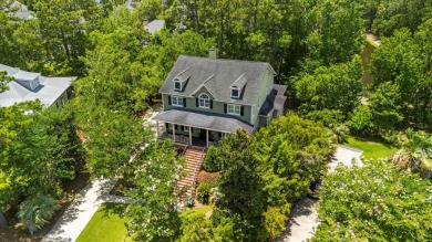 Nestled on a picturesque tree-lined street, this expansive home on Charleston National Golf Club in South Carolina - for sale on GolfHomes.com, golf home, golf lot